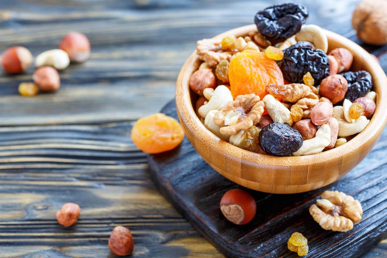 Wooden bowl with assorted nuts